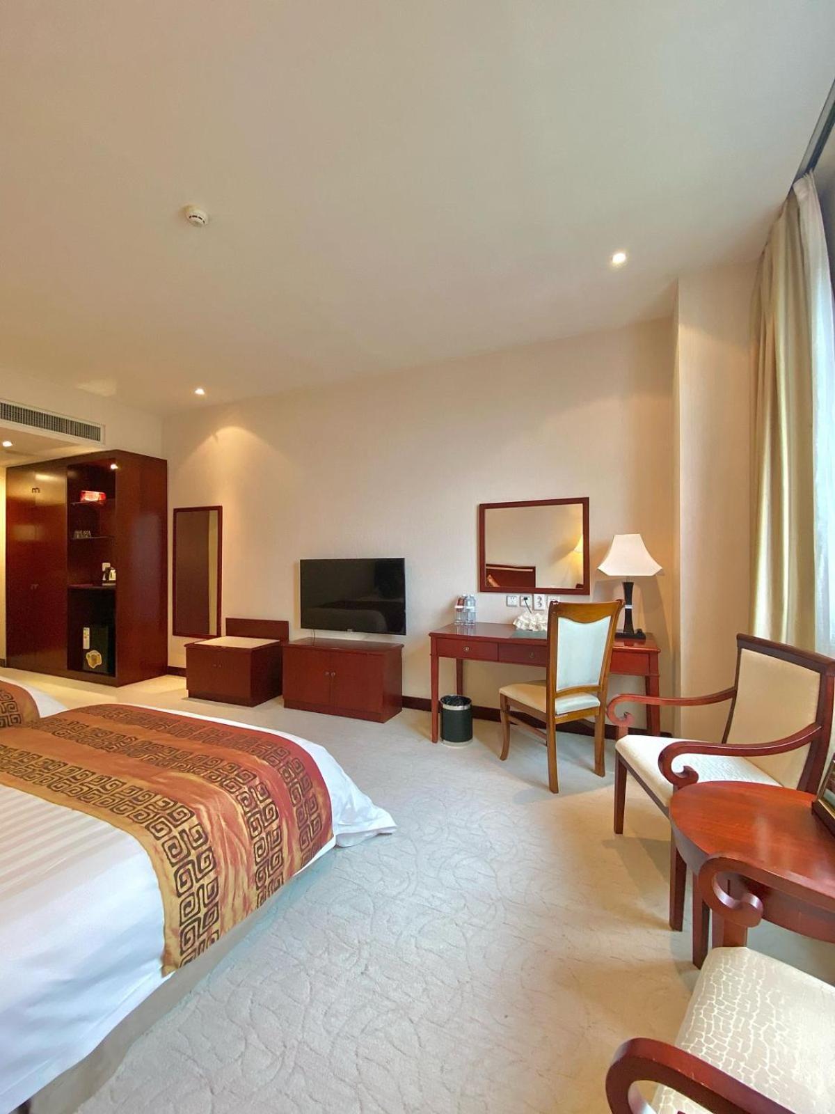 Beijing Palace Soluxe Hotel Astana Екстериор снимка A room at the hotel
