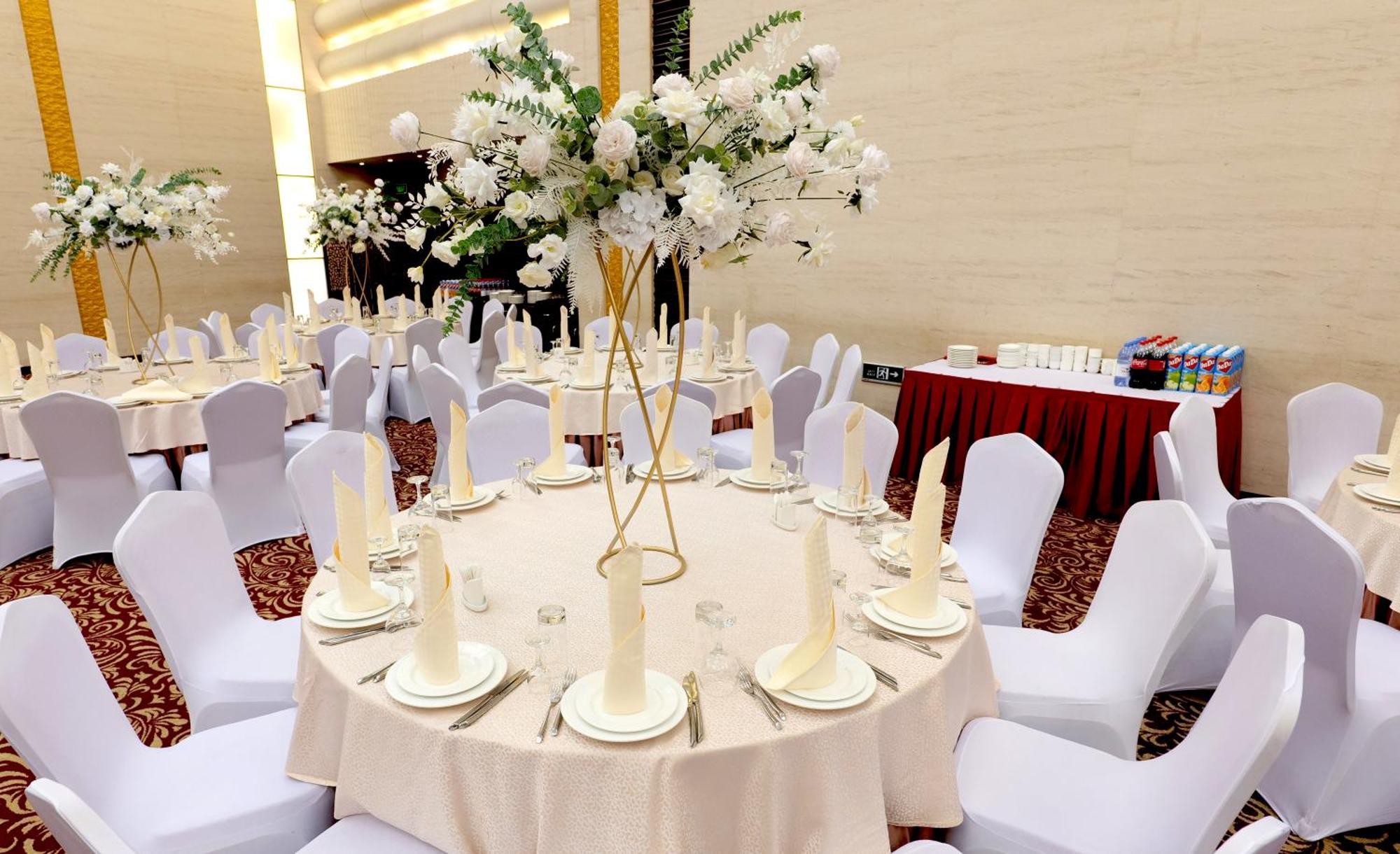 Beijing Palace Soluxe Hotel Astana Екстериор снимка A table set for a formal dinner