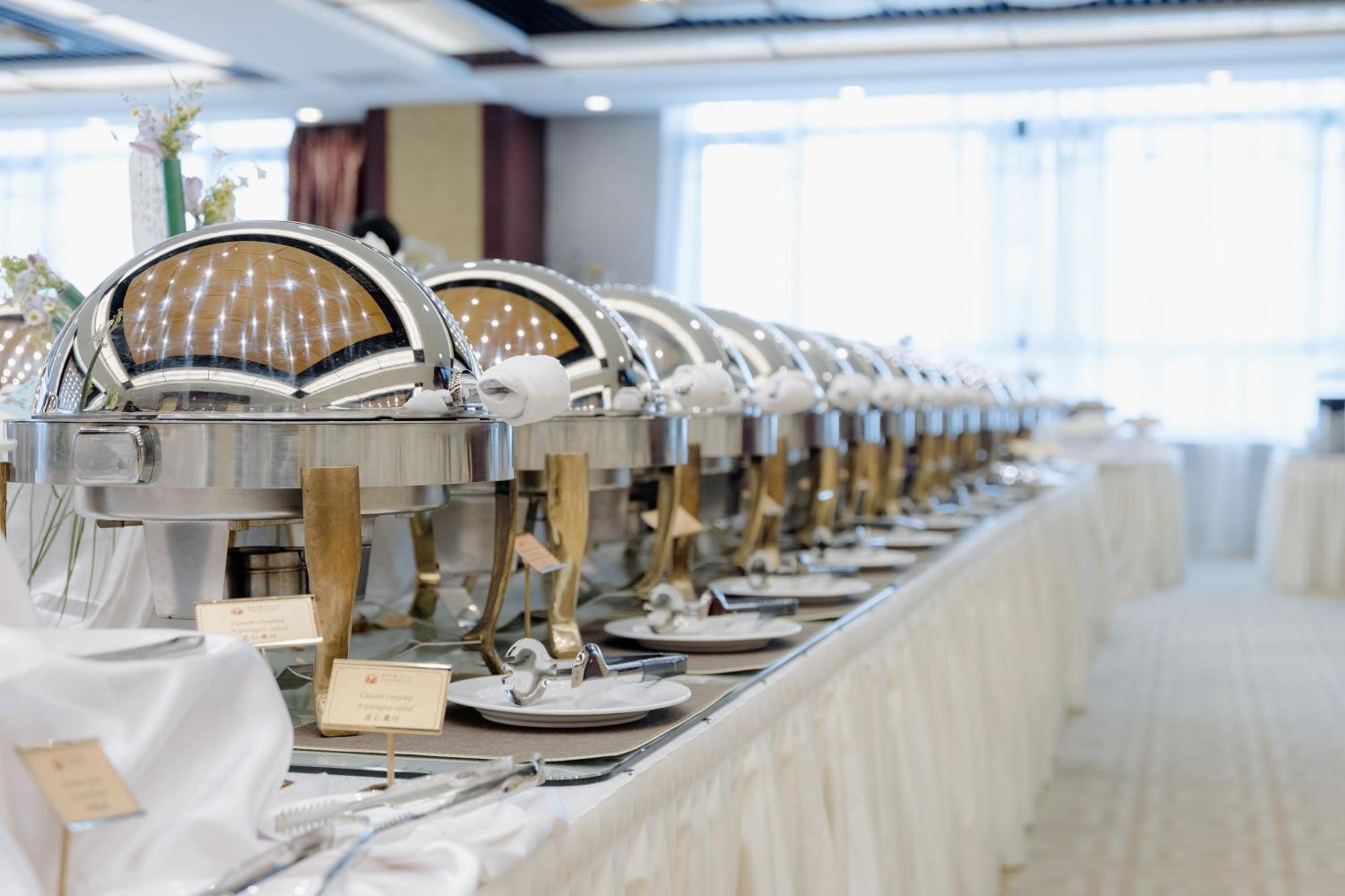 Beijing Palace Soluxe Hotel Astana Екстериор снимка A row of chafing dishes