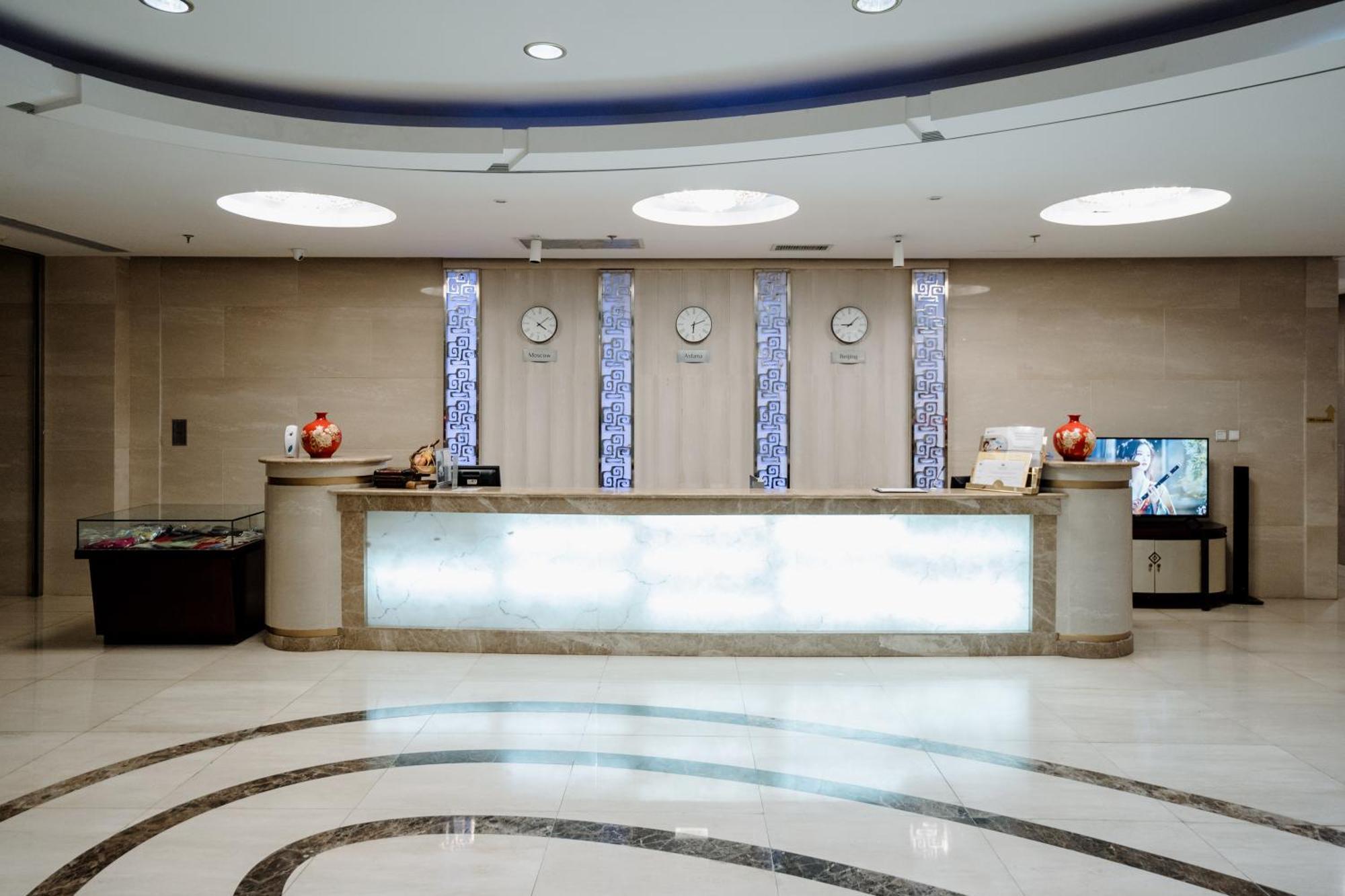 Beijing Palace Soluxe Hotel Astana Екстериор снимка Reception desk